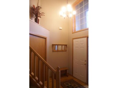 The inviting foyer is highlighted by the large two