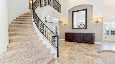 Elegant entry with custom railing