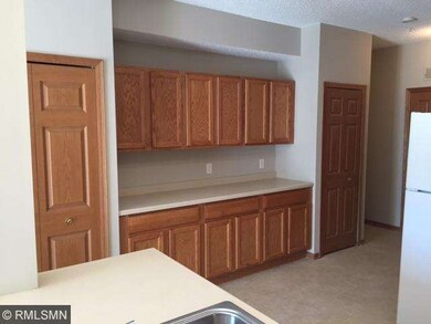 Kitchen has a lot of cabinetry and the counter spa
