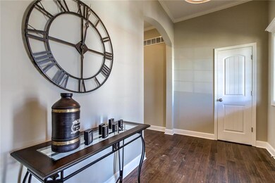 The entry way features hardwood floors.