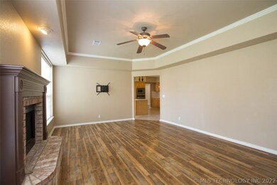 Additional view of Family Room reveals Kitchen and