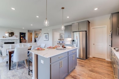 Gather and entertain on your center island. Model picture shown.