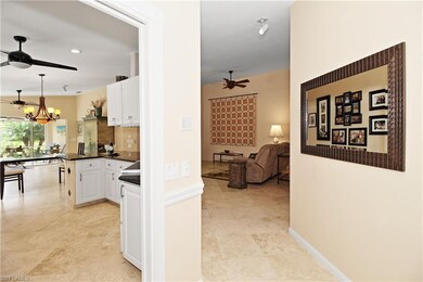 Elegant Travertine Flooring throughout.
