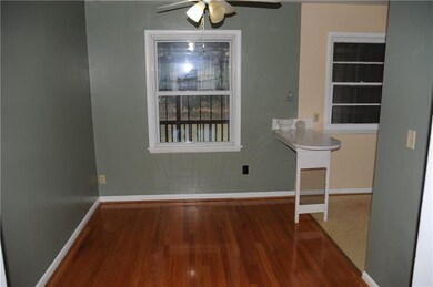 Dining room with lovely wood floors.