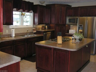 Large Island and hi-end Kitchen appliances.  Doubl