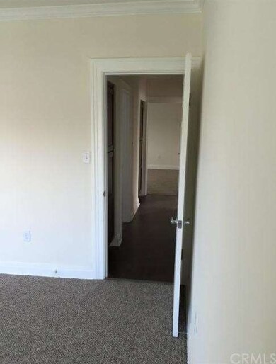Hallway from bedroom 1 to bedroom 2 & Bathroom