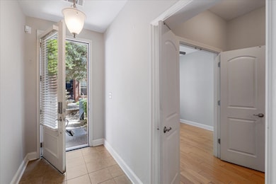 Interior space with baseboards and light wood-styl