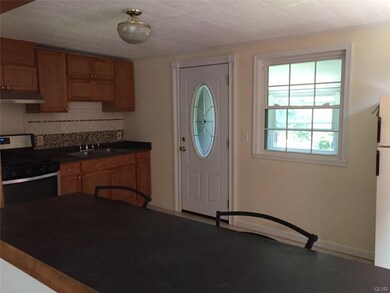 Kitchen with door to mudroom
