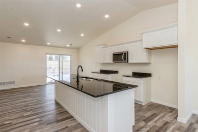Photos is of a similar property.