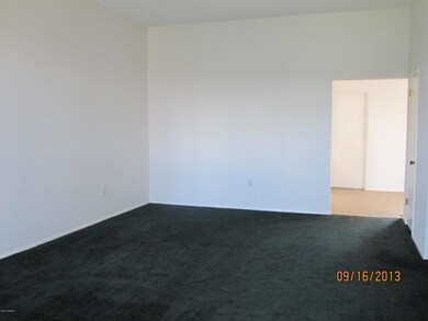 Living Room Opens to Kitchen/Dining Area