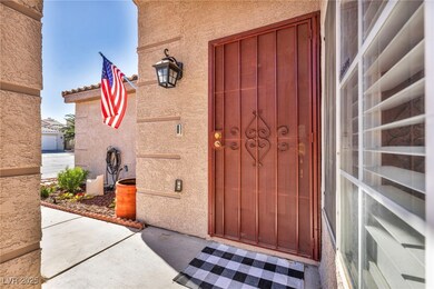 Property entrance featuring a patio area and stucc
