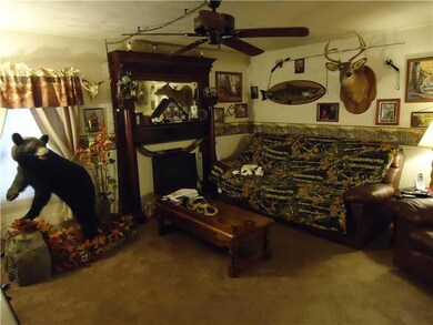 Living Room. ELEC LOG FIREPLACE