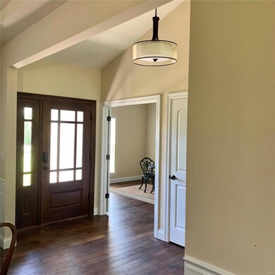 Fabulous Entry with study/den behind french doors 