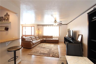 This nice size living room is flooded with natural