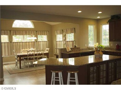 Kitchen - Gourmet kitchen with wall of windows mor