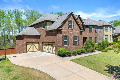 View of front of home featuring fence, a shingled 