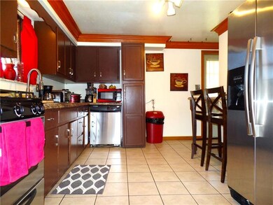 Spacious main floor Kitchen offers ceramic tile fl