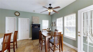 Eat in Kitchen area.  Customized Fan.  Glass door to back yard.  Plenty of Sunlight