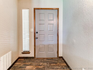 Wide entryway leading to the living room