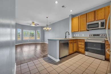 Kitchen with appliances with stainless steel finis