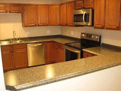 Kitchen has a pass through to the living room crea