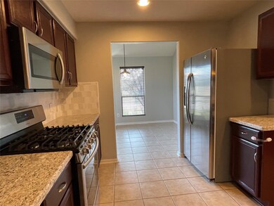 Side by Side Stainless Steel Refrigerator is included.