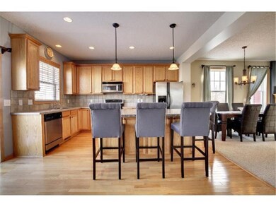 Big island in this lovely kitchen with stainless s