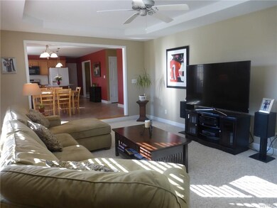 Family room features tray ceiling
