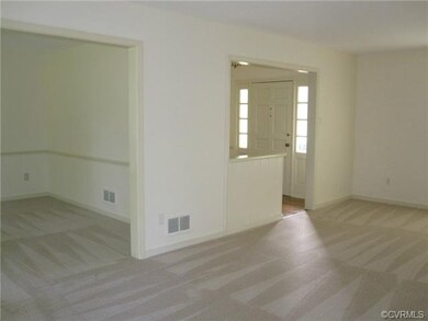 From living room looking toward dining room & foye