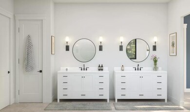 Primary bath with freestanding dual vanities