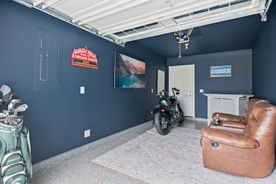 3rd car garage bay - epoxy floor, gas heater, direct access to fenced backyard, finished drywall and painted.  Wow!