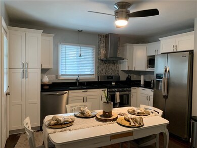 Beautiful Kitchen with Granite Counters and Stainl