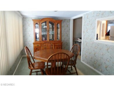 DINING ROOM 12X9 WITH PASS THRU WINDOW FROM KITCHE
