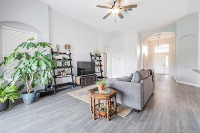 large front hallway leading into open living room