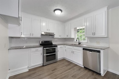 Kitchen with updated stainlees steel appliances an