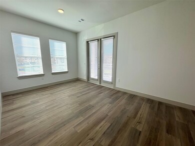 Spare room with light hardwood / wood-style floors