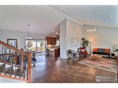 Living room open to kitchen and dining