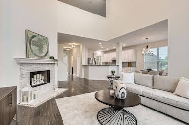 Living area featuring dark wood-type flooring, a 