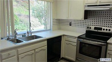 Enjoy the view while in your kitchen. Dishwasher a
