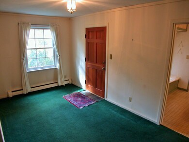 ROOMY FRONT FOYER IS 15'X8'6'