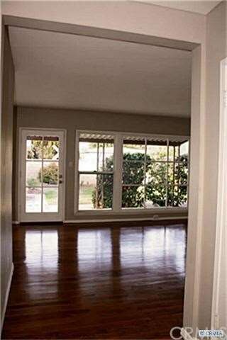 View from entry into living room - look at those g