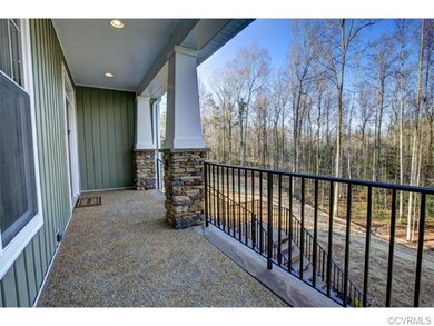 The covered front porch would be the perfect place