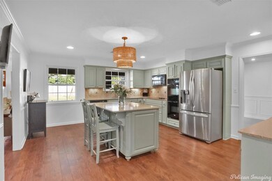 Kitchen featuring light hardwood / wood-style floo