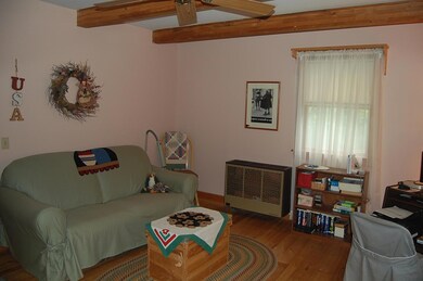 Office area w/ hardwood flooring