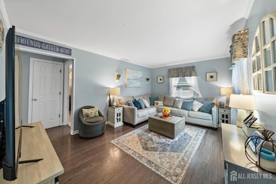 LIVING ROOM WITH VIEW TO HALLWAY