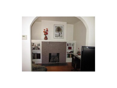 Den/Study. Charming fireplace converted to gas