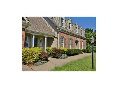 This home also offers mature landscaping & a brick