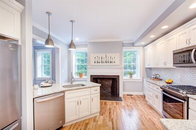 Lots of natural light and working fireplace make t