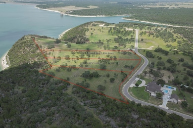 Aerial overview of property's location with a lar