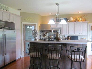 large size eat-in bar, view of Pantry door in back